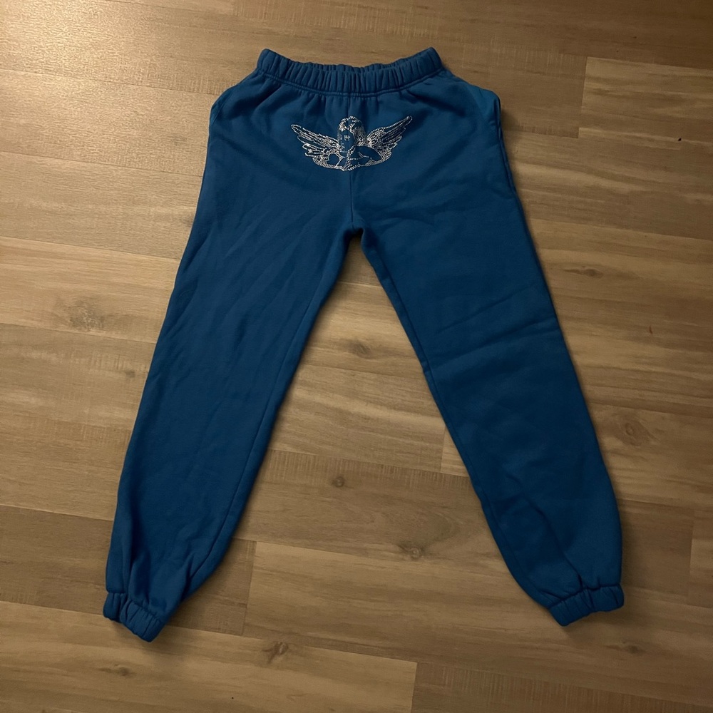 Woman’s bright blue Baby Angel rhinestone sweatpants